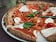 Simple italian pizza with cherry tomatoes